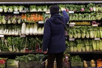 A customer shops for produce at a grocery store In Toronto on Friday, Feb. 2, 2024. The federal NDP is accusing Ottawa of misrepresenting a task force announced last fall that it said would investigate grocery retailers’ practices. THE CANADIAN PRESS/Cole Burston