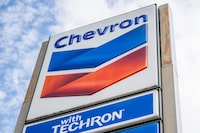 AUSTIN, TEXAS - OCTOBER 23: A Chevron gas station sign is shown on October 23, 2023 in Austin, Texas. Chevron is acquiring Hess Corp. in a $53 billion deal that will be paid with stock. The deal comes less than two weeks after Exxon Mobil shared that it would be buying Pioneer Natural Resources for approximately $60 billion. Pressure on oil prices have increased due to a number of factors including the war in Ukraine and cutbacks in oil production from Russia and Saudi Arabia. Analysts from the U.S. Energy Information Administration warn that the war between Israel and Hamas has the potential to further disrupt oil production.  (Photo by Brandon Bell/Getty Images)