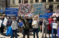 A crowd rallies for coastal protection legislation in front of the Nova Scotia legislature in Halifax on Wednesday May 8, 2024. The Progressive Conservative government announced in February that it would not put into force the Coastal Protection Act, which was passed in 2019 by the former Liberal government with support from all parties in the legislature. THE CANADIAN PRESS/Keith Doucette