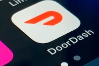 FILE - The DoorDash app is shown on a smartphone on Feb. 27, 2020, in New York. DoorDash reports earnings on Wednesday, Nov. 1, 2023.  (AP Photo, File)