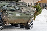 A military vehicle is pictured during a visit of Canada's Minister of Defence in Adazi, Latvia, on February 3, 2022. (Photo by Gints Ivuskans / AFP) (Photo by GINTS IVUSKANS/AFP via Getty Images)