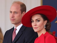 FILE - Britain's Prince William, left, and Britain's Kate, Princess of Wales, attend a ceremonial welcome for the President and the First Lady of the Republic of Korea at Horse Guards Parade in London, England on Nov. 21, 2023. Charles' illness comes at a awkward time, as his daughter in law, the Princess of Wales, has also had her own health issues, having recently been hospitalized for two weeks following abdominal surgery following at the private London clinic. The former Kate Middleton won't be returning to public duties until after Easter and that will prompt other members of the royal family to pick up the slack.(Chris Jackson/Pool Photo via AP, File)