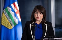Alberta Health Minister Adriana LaGrange makes a health-care announcement in Calgary on Thursday, Dec. 21, 2023. LaGrange says a non-profit that shipped a stroke patient to a motel for his long-term recovery will be taken off a roster of agencies that provide non-medical care in the community. THE CANADIAN PRESS/Todd Korol