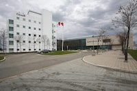 The National Microbiology Laboratory is shown in Winnipeg on May 19, 2009. Three former senior judges will have the final say on the public disclosure of documents related to the firing of two scientists from the national microbiology laboratory. THE CANADIAN PRESS/John Woods