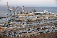 FILE PHOTO: New imported cars are seen in a parking lot next to the Eilat port, Israel, June 12, 2018. Picture taken June 12, 2018. REUTERS/Amir Cohen/File Photo