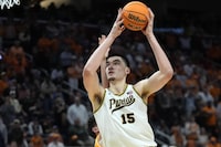 Purdue center Zach Edey (15) attempts a basket during the second half of an Elite Eight college basketball game against Tennessee in the NCAA Tournament, Sunday, March 31, 2024, in Detroit. (AP Photo/Paul Sancya)