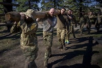 Recruits of the 3rd Assault Brigade train in the Kyiv region, Ukraine, Tuesday, April 9, 2024. (AP Photo/Vadim Ghirda)