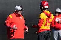 Kansas City Chiefs head coach Andy Reid, left, talks with quarterback Patrick Mahomes (15) during an NFL football practice in Tempe, Ariz., Friday, Feb. 10, 2023. The Chiefs will play against the Philadelphia Eagles in Super Bowl 57 on Sunday (AP Photo/Ross D. Franklin)