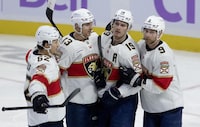 Florida Panthers centre Sam Reinhart (second from left) celebrates his goal with defenceman Brandon Montour(left), left wing Matthew Tkachuk and centre Sam Bennett(right) 
during first period NHL action against the Ottawa Senators, Monday, November 27, 2023 in Ottawa.  THE CANADIAN PRESS/Adrian Wyld