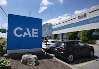 <p>The CAE logo is seen in front of the aeropspace company’s plant, Thursday, July 21, 2022 &nbsp;in Montreal. THE CANADIAN PRESS/Ryan Remiorz</p>