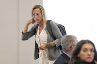 Carrie Low stands during a break in her testimony at a The Nova Scotia Police Review Board hearing in Halifax on Monday, July 10, 2023. The review board has concluded that problems with the conduct of the Halifax police in a 2018 sexual assault case aren't sufficient for it to make recommendations for changes. THE CANADIAN PRESS/Darren Calabrese