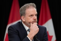 Federal Health Minister Mark Holland listens to a question from a reporter during a news conference, Tuesday, December 12, 2023 in Ottawa. Some lawyers are pushing their national advocacy organization to withdraw its support of expanding medical assistance in dying to those suffering solely from a mental disorder. THE CANADIAN PRESS/Adrian Wyld