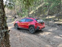 The 2024 Subaru Crosstrek on an off-road trail in British Columbia.