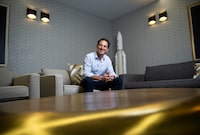 Telesat CEO Dan Goldberg sits beside a model of a Ariane 5 rocket that launched the Anik F2 satellite in 2004, at the company's headquarters in downtown Ottawa, on Friday, Sept. 4, 2020. (Justin Tang for The Globe and Mail)