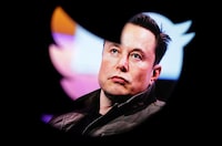 FILE PHOTO: Elon Musk's photo is seen through a Twitter logo in this illustration taken October 28, 2022. REUTERS/Dado Ruvic/Illustration/File Photo