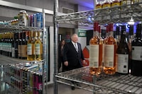Ontario Premier Doug Ford attends a media availability at a convenience store in Toronto, Thursday, Dec. 14, 2023. 
A number of health organizations are asking Ontario to develop a comprehensive strategy to prepare for the province's loosening alcohol rules. THE CANADIAN PRESS/Chris Young