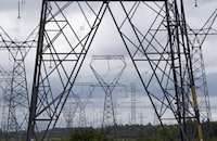 Power lines are seen near Kingston, Ont., Wednesday, Sept. 7, 2022. THE CANADIAN PRESS/Adrian Wyld