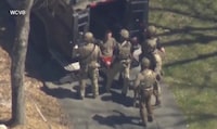 FBI agents arrest Jack Teixeira, an employee of the U.S. Air Force National Guard, in connection with an investigation into the leaks online of classified U.S. documents, outside a residence in this still image taken from video in North Dighton, Massachusetts, U.S., April 13, 2023. WCVB-TV via ABC via REUTERS. ATTENTION EDITORS - NO SALES NO ARCHIVES THIS IMAGE HAS BEEN SUPPLIED BY A THIRD PARTY MANDATORY CREDIT