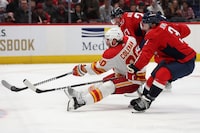 WASHINGTON, DC - OCTOBER 16: Blake Coleman #20 of the Calgary Flames shoots against the Washington Capitals during the third period at Capital One Arena on October 16, 2023 in Washington, DC. (Photo by Patrick Smith/Getty Images)