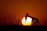FILE - A pump jack operates as the sun begins to set on the western horizon March 7, 2022, near Pleasant Farms, an unincorporated community in southeastern Ector County, Texas. House Republicans are set to approve a sprawling energy package that counters virtually all of President Joe Biden's agenda to address climate change. (Jacob Ford/Odessa American via AP)