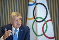 FILE PHOTO: International Olympic Committee (IOC) President Thomas Bach attends the opening of the Executive Board meeting at the Olympic House in Lausanne, Switzerland, March 28, 2023. REUTERS/Denis Balibouse/File Photo