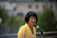 Newly elected Mayor Olivia Chow delivers her first media availability after being sworn-in at Toronto City Hall, on Wednesday, July 12, 2023. The City of Toronto says it has designated more than 200 shelter spaces for asylum seekers. THE CANADIAN PRESS/ Tijana Martin