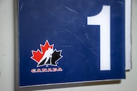 A Hockey Canada logo is seen on the door to a dressing room the organizations home rink in Calgary, Alta., Sunday, Nov. 6, 2022.THE CANADIAN PRESS/Jeff McIntosh 