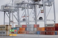 Shipping containers are shown at the Port of Montreal, Sunday, April 25, 2021.Statistics Canada says the country's merchandise trade surplus narrowed in February as imports rose at a faster pace than exports.&nbsp;THE CANADIAN PRESS/Graham Hughes
