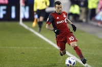 Toronto FC forward Sebastian Giovinco (10) keeps the ball in bounds as he runs up field during MLS soccer action against the Atlanta United in Toronto, Sunday, Oct. 28, 2018. Toronto FC has opened its doors again to Giovinco. The 36-year-old Italian is not back with the MLS club. But the former MLS MVP, has once again indicated his interest in resuming his career with Toronto colours and the team has offered to let the club legend use its north Toronto training facility. THE CANADIAN PRESS/Cole Burston