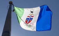 The Yukon provincial flag flies in Ottawa on Monday, July 6, 2020. The Yukon government has upgraded the Klondike River to a flood warning, the highest level of its flood advisories. THE CANADIAN PRESS/Adrian Wyld