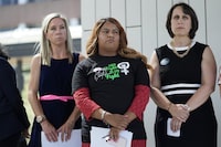 FILE - Amanda Zurawski, who developed sepsis and nearly died after being refused an abortion when her water broke at 18 weeks, left, and Samantha Casiano, who was forced to carry a nonviable pregnancy to term and give birth to a baby who died four hours after birth, center, stand with their attorney Molly Duane outside the Travis County Courthouse, Wednesday, July 19, 2023, in Austin, Texas. A Texas judge ruled Friday, Aug. 4, 2023, the state’s abortion ban has proven too restrictive for women with serious pregnancy complications and must allow exceptions without doctors fearing the threat of criminal charges. The challenge is believed to be the first in the U.S. brought by women who have been denied abortions since the Supreme Court last year overturned Roe v. Wade, which for nearly 50 years had affirmed the constitutional right to an abortion. (AP Photo/Eric Gay, File)