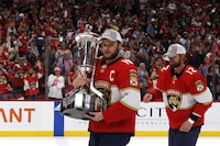 SUNRISE, FLORIDA - MAY 24: Aleksander Barkov #16 of the Florida Panthers celebrates with the Prince of Wales Trophy after defeating the Carolina Hurricanes in Game Four to win the Eastern Conference Final of the 2023 Stanley Cup Playoffs at FLA Live Arena on May 24, 2023 in Sunrise, Florida. (Photo by Bruce Bennett/Getty Images)