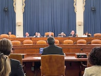 Michael Chong (centre) appears before the Congressional-Executive Commission on China in Washington, D.C. on Tuesday, Sept.12, 2023.The Conservative MP at the centre of Canada's foreign interference saga is urging Capitol Hill lawmakers to work with their northern neighbour to battle Beijing. THE CANADIAN PRESS/James McCarten