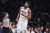 Apr 20, 2023; Brooklyn, New York, USA; Philadelphia 76ers center Joel Embiid (21) grimaces during game three of the 2023 NBA playoffs against the Brooklyn Nets at Barclays Center. Mandatory Credit: Wendell Cruz-USA TODAY Sports
