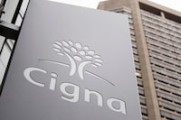 FILE - This Nov. 26, 2018, file photo shows the Cigna Corp., logo at the headquarters of the health insurer in Philadelphia, Cigna Corp. reports financial earns on Thursday, Oct. 31, 2019. (AP Photo/Matt Rourke, File)