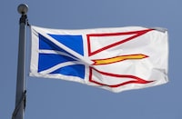 A controversial wind-powered hydrogen development proposed for the west coast of Newfoundland has cleared its last hurdle with the provincial government. Newfoundland and Labrador's provincial flag flies in Ottawa on July 6, 2020. THE CANADIAN PRESS/Adrian Wyld