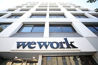 BERKELEY, CALIFORNIA - AUGUST 09: A sign is posted on the exterior of a WeWork office on August 09, 2023 in Berkeley, California. New York-based workspace-sharing company WeWork says it has "substantial doubt" it can stay in business due to continued financial losses. (Photo by Justin Sullivan/Getty Images)