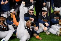 MINNEAPOLIS, MINNESOTA - OCTOBER 11: Members of the Houston Astros celebrate after their victory against the Minnesota Twins in Game Four of the Division Series at Target Field on October 11, 2023 in Minneapolis, Minnesota.  (Photo by Stephen Maturen/Getty Images)