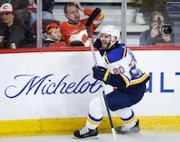 St. Louis Blues forward Brandon Saad (20) celebrates his game-winning goal during third period NHL hockey action against the Calgary Flames in Calgary, Tuesday, Jan. 23, 2024.THE CANADIAN PRESS/Jeff McIntosh