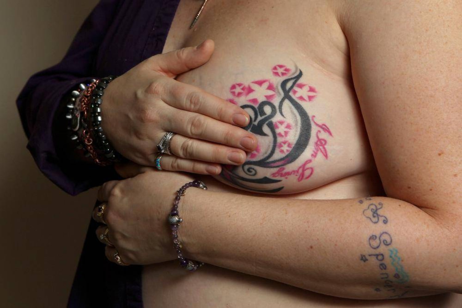 Facebook Removes Photo Of Breast Cancer Survivor's Tattoo, Users