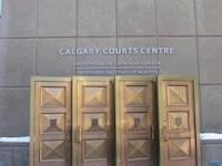 The sign at the Calgary Courts Centre in Calgary is shown on Jan. 5, 2018.