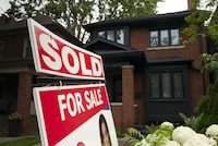 The Toronto Regional Real Estate Board says Greater Toronto home sales in April were down five per cent from last year, but new listings surged which created more choice for buyers and kept selling prices stable. A west-end Toronto home for sale is shown in a July 15, 2023 file photo. THE CANADIAN PRESS/Graeme Roy