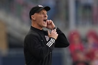 Toronto FC Head Coach Bob Bradley yells to his team on the touch line during MLS action against Nashville SC in Toronto, on Saturday, June 10, 2023.THE CANADIAN PRESS/Chris Young