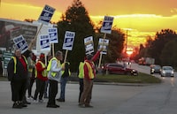 File - UAW local 862 members strike outside of Ford's Kentucky Truck Plant in Louisville, Ky. on Oct. 12, 2023. (Michael Clevenger/Courier Journal via AP, File)