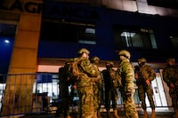 Military officials stand guard outside the Flagrancy Unit, where former Ecuador Vice President Jorge Glas is believed to be detained, in Quito, Ecuador April 6, 2024. REUTERS/Karen Toro