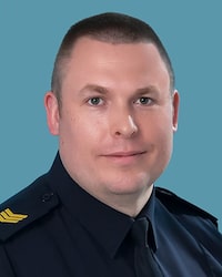 Ontario Provincial Police Sgt. Eric Mueller is shown in a handout photo. Police officers, dignitaries, family and friends will pay tribute to Ontario Provincial Police Sgt. Eric Mueller Thursday at the 10th funeral for a police officer killed on the job in Canada in the last eight months. THE CANADIAN PRESS/HO-OPP **MANDATORY CREDIT**