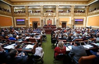 FILE - In this Jan. 28, 2019, file photo, the floor of the Utah House of Representatives is shown during the first day of the Utah legislative session, in Salt Lake City. People angry about sweeping changes made to a voter-approved law legalizing medical marijuana in Utah called on the state's highest court Monday, March 25, 2019, to rein in the Legislature's power to alter measures passed at the ballot box. (AP Photo/Rick Bowmer, file)