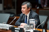 Conservative MP for Wellington-Halton Hills Michael Chong prepares to appear as a witness at the Standing Committee on Procedure and House Affairs (PROC) regarding foreign election interference on Parliament Hill in Ottawa, on Tuesday, May 16, 2023. THE CANADIAN PRESS/Spencer Colby