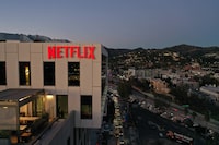 (FILES) The Netflix logo is seen on top of their office building in Hollywood, California, January 20, 2022. Netflix topped expectations on April 18, 2024, as it reported 9.3 million new subscribers and profits of $2.3 billion in the first three months of the year. (Photo by Robyn Beck / AFP) (Photo by ROBYN BECK/AFP via Getty Images)