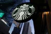 FILE PHOTO: A Starbucks sign is show on one of the companies stores in Los Angeles, California, U.S. October 19,2018.  REUTERS/Mike Blake/File Photo